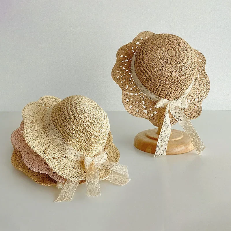 Sommerlicher Strohhut für Babymädchen mit Spitzenschleife, Strand- und Reisehut für Kinder, Sonnenschutz-Bucket-Hat mit breiter Krempe Image
