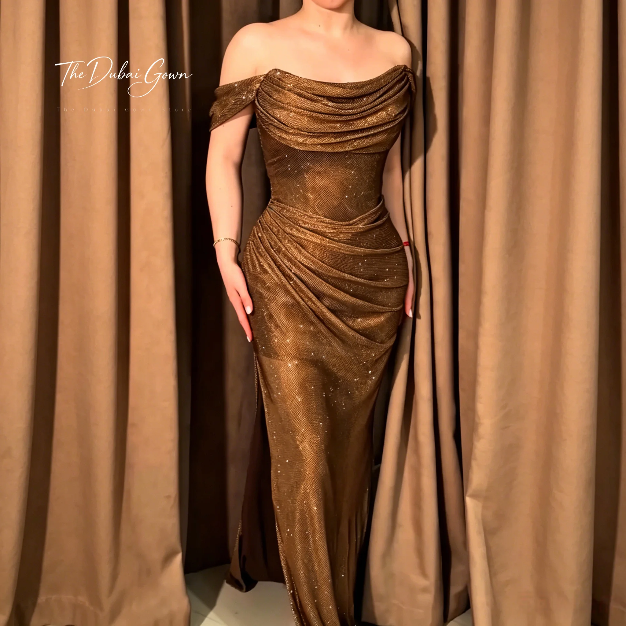 Off-the-shoulder strapless floor-length mermaid formal gown in brown featuring sequins and a slit skirt
