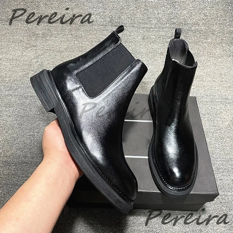 Schwarze und weiße Chelsea-Stiefel aus echtem Leder, im britischen Stil, mit runder Spitze, dicker Sohle, kurze Stiefel, modische, handgefertigte Herrenschuhe.