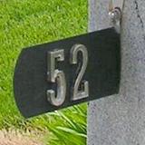 Spira Mailbox 1-Line Hanging Sign Metal in Black | 6.5 H x 10 W x 0.5 D in | Wayfair SPIRA-P001