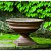 Campania International Newberry Cast Stone Urn Planter Concrete, Copper in Brown | 17.25 H x 26 W x 26 D in | Wayfair P-596-BR