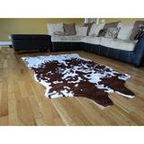 Brown/White 84 x 60 x 0.5 in Indoor Area Rug - Union Rustic Aamarion Animal Print 5' x 7' Area Rug, Synthetic | 84 H x 60 W x 0.5 D in | Wayfair