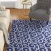 Blue/Navy 63 x 0.5 in Area Rug - Charlton Home® Susan Floral Navy Blue/Ivory Area Rug Polypropylene | 63 W x 0.5 D in | Wayfair