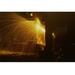 Buyenlarge Welder's Torch Has Sparks Fly on Locomotive Factory Floor - Photograph Print in Black/Yellow | 44 H x 66 W x 1.5 D in | Wayfair