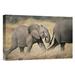 East Urban Home Kenya Amboseli National Park 'African Elephant Baby Following Mother' - Photograph Print on Canvas in White | Wayfair