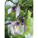 Northlight Seasonal LED Lighted Tea Candle w/ Purple Flowers Canvas Wall Art 15.75" x 11.75" Canvas in Green/Indigo | Wayfair NORTHLIGHT NJ37325