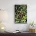 East Urban Home 'Orangutan Standing on Fallen Tree Trunk' Framed Photographic Print on Canvas in Green | 18 H x 12 W x 1.5 D in | Wayfair