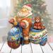 The Holiday Aisle® Fifield Box Santa on Motorbike Derevo Collection Resin in Blue/Brown/Red | 5 H x 4 W x 5 D in | Wayfair