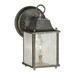 Breakwater Bay Roseland 8.75" H Outdoor Wall Lantern Glass/Metal in Brown | 8.75 H x 4.5 W x 6 D in | Wayfair BKWT3503 42515727