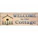 August Grove® Welcome to Cottage Wooden Sign Wall Décor in Brown | 8 H x 24 W in | Wayfair 5EE860CA5DFF45F883498920322A1CC5