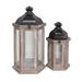 World Menagerie 2 Piece Glass & Metal Lantern Set Wood/Glass/Metal in Brown | 25 H x 12.5 W x 12.5 D in | Wayfair 1882DB39992C470091055CF87607680C