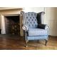 Chesterfield Queen Anne high back wing chair presented in vintage grey leather and grey Harris tweed